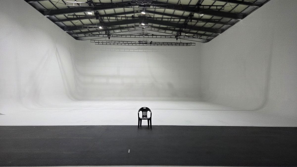 Empty white cyclorama stage at StageKnot studio