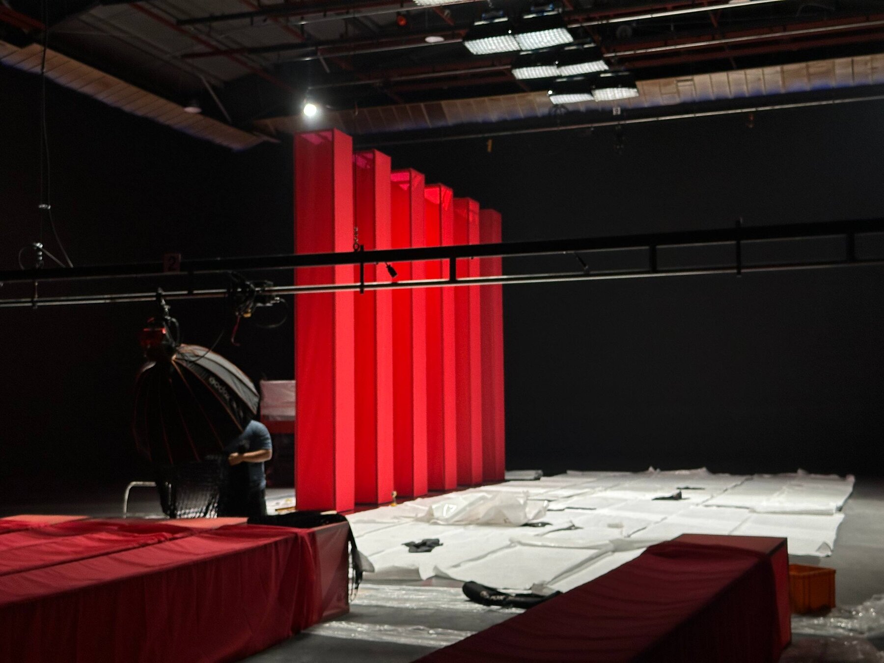 A full row of tall red fabric columns installed